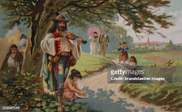 Gypsy family with Gypsy violinist. Transylvania. Coloured picture postcard . About 1910. Reproduction bases on a painting.