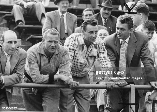 The Austrian soccer players Friedrich Kominek; Bimek; Ernst Bokon und ganz rechts Ernst Happel.Vienna. 1954. Photograph.