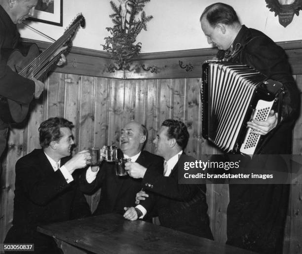 Farewell party of the Rapid Team after the Championship. Left Ernst Happel; right Walter Zemann. . Photograph.