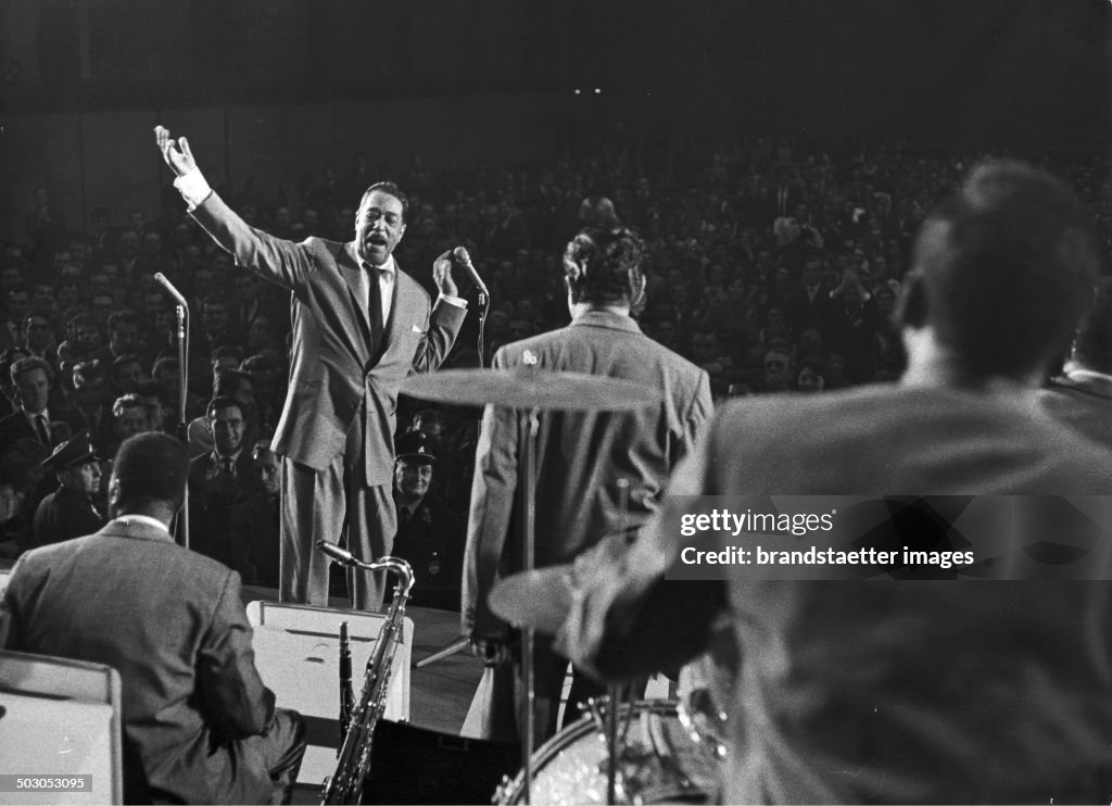 Duke Ellington And His Orchestra Receiving Applause From The Audience At A Concert. Photograph By Fran Hubmann. Ca. 1965.