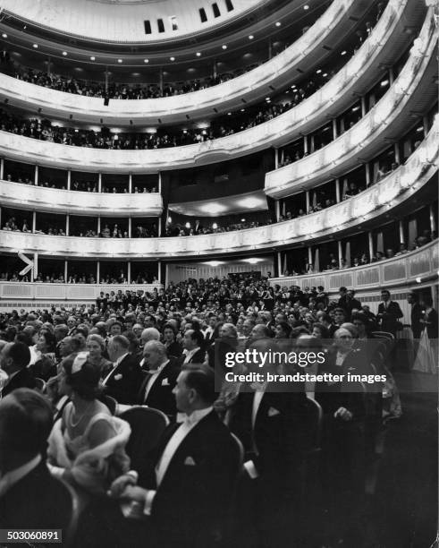 Audience at the reopening of the Vienna State Opera. November 1955. Photograph by Franz Hubmann. .