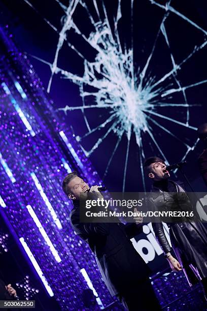 Scott Hoying and Mitch Grassi of Pentatonix perform onstage at Dick Clark's New Year's Rockin' Eve with Ryan Seacrest 2016 on December 31, 2015 in...