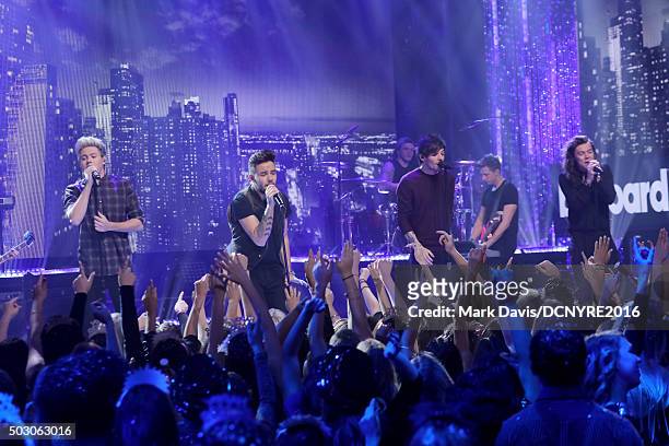 Niall Horan, Liam Payne, Louis Tomlinson and Harry Styles of One Direction perform onstage at Dick Clark's New Year's Rockin' Eve with Ryan Seacrest...