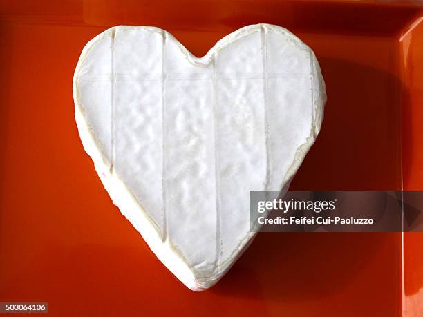 heart shape french cheese camembert of normandy - cheese heart photos et images de collection