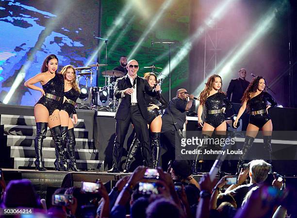 Pitbull perfoms at Pitbull's New Years Eve Revolution 2016 at Bayfront Park Amphitheater on December 31, 2015 in Miami, Florida.