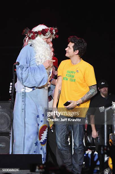 Bill Walton appears on stage with John Mayer of Dead and Company at The Forum on December 31, 2015 in Inglewood, California.