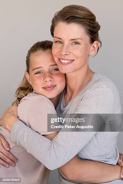 beauty picture of mother and daughter in studio - 40s woman t shirt studio imagens e fotografias de stock