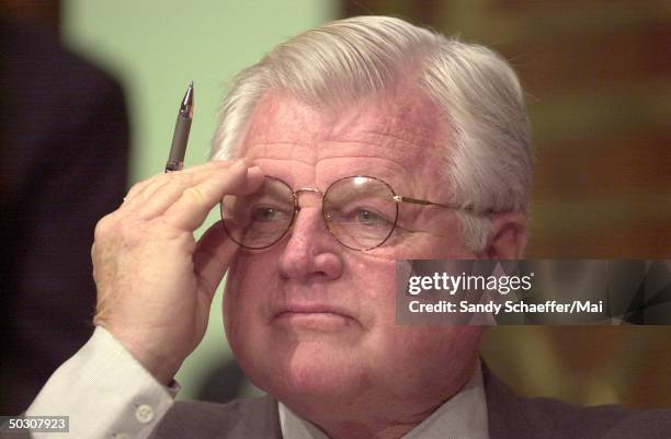 Senator Ted Kennedy of Massachusetts attending hearings and listening to testimony by Attorney General John Ashcroft.