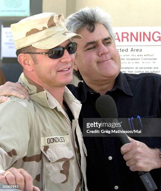 Television personality Jay Leno w. Airman during his visit visit w. Troops overseas as was arranged by Armed Forces Entertainment at the Pentagon.
