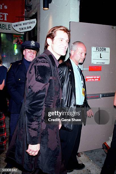 Comedian Jim Carrey arriving at Miramax party after The Concert for New York.