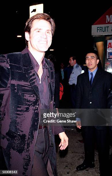 Comedian Jim Carrey arriving at Miramax party after The Concert for New York.