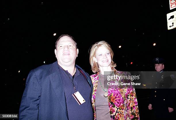 President of Miramax Films Harvey Weinstein and wife arriving at Miramax party after The Concert for New York.