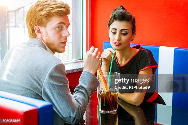 young couple in vintage bar - 1950's style - rockabilly stock pictures, royalty-free photos & images