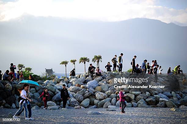 Tourist from mainland China are seen at Chishingtan Beach on January 1, 2016 in Hualien, Taiwan. The city of Hualien is the county seat of Hualien...