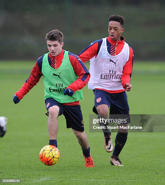 Dan Crowley and Chris Willock of Arsenal during a training session at London Colney on January 1, 2016 in St Albans, England.