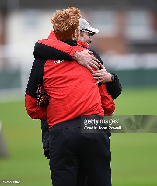 Jurgen Klopp manager of Liverpool talking with Adam Bogdan of Liverpool during a training session at Melwood Training Ground on January 1, 2016 in...