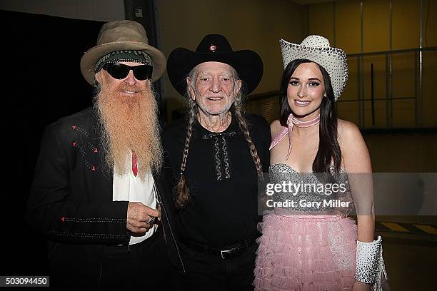 Billy Gibbons, Willie Nelson and Kacey Musgraves pose backstage at ACL Live on December 31, 2015 in Austin, Texas.