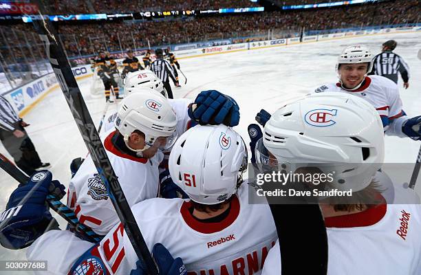 David Desharnais of the Montreal Canadiens celebrates a goal with his teammates during the first period of the 2016 Bridgestone NHL Classic at...