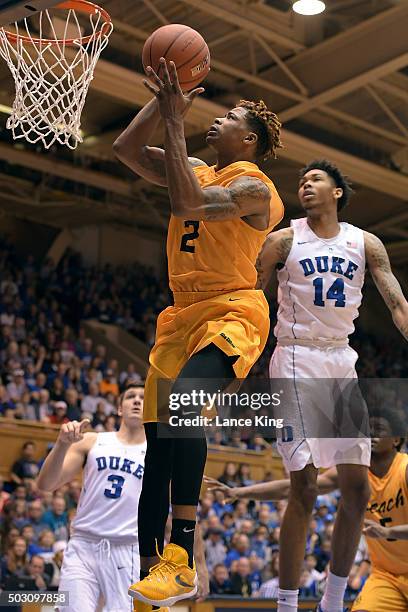 Nick Faust of the Long Beach State 49ers goes to the basket against the Duke Blue Devils at Cameron Indoor Stadium on December 30, 2015 in Durham,...