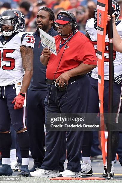 Defensive Coordinator Romeo Crennel of the Houston Texans coaches against the Tennessee Titans at Nissan Stadium on December 27, 2015 in Nashville,...