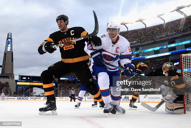 Zdeno Chara of the Boston Bruins battles for the puck against Max Pacioretty of the Montreal Canadiens during the first period of the 2016...