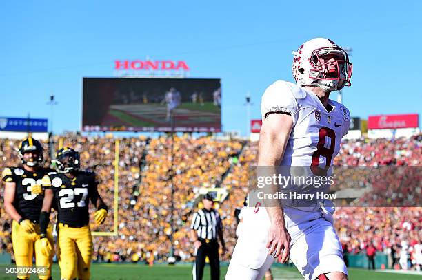 Quarterback Kevin Hogan of the Stanford Cardinal runs in an 8 yard touchdown in the first quarter against the Iowa Hawkeyes in the 102nd Rose Bowl...