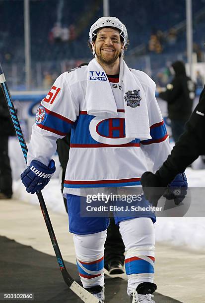 David Desharnais of the Montreal Canadiens smiles as he leaves the ice after his team defeated the Boston Bruins 5-1 in the 2016 Bridgestone NHL...
