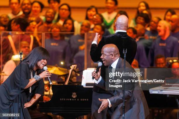 American sibling Gospel singers CeCe and BeBe Winans perform with the Inspirational Orchestra conducted by Ray Chew at 'A Night of Inspiration' at...