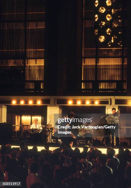 Tango dancers perform to a live band on the Fountain Plaza at Lincoln Center's Midsummer Night Swing, New York, New York, July 9, 1993.