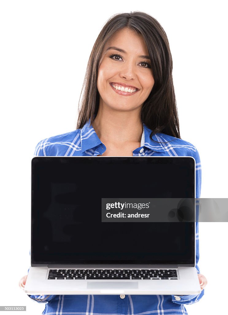 Woman holding a laptop