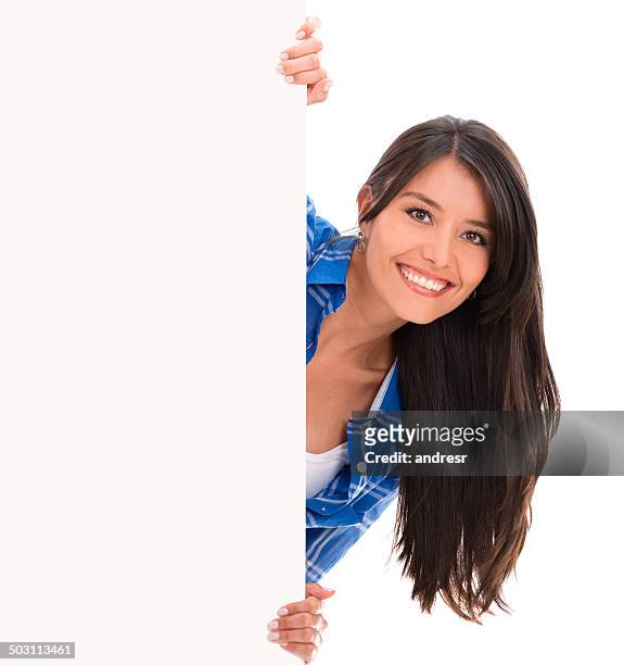 beautiful woman with a banner - peeking through stock pictures, royalty-free photos & images