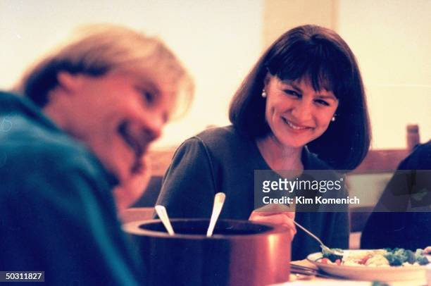 Author Dr. Nancy Snyderman & TV producer husband Doug Meyers eating dinner at home.