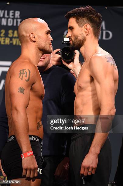 Welterweight champion Robbie Lawler and opponent Carlos Condit face off during the UFC 195 weigh-in at the MGM Grand Conference Center on January 1,...