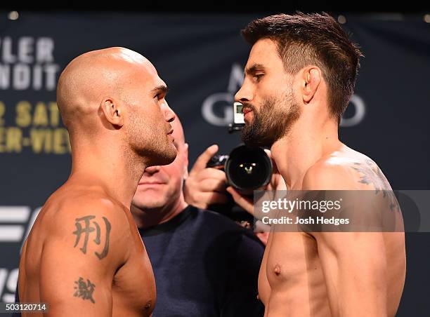 Welterweight champion Robbie Lawler and opponent Carlos Condit face off during the UFC 195 weigh-in at the MGM Grand Conference Center on January 1,...