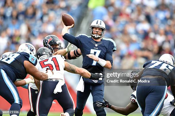 Quarterback Zach Mettenberger of the Tennessee Titans passes during a NFL game against the Houston Texans at Nissan Stadium on December 27, 2015 in...