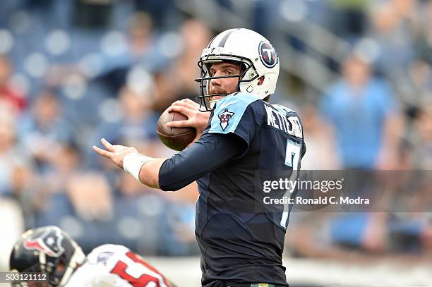 Quarterback Zach Mettenberger of the Tennessee Titans passes during a NFL game against the Houston Texans at Nissan Stadium on December 27, 2015 in...