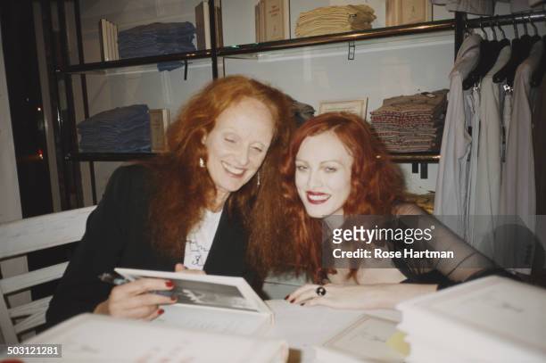 British creative director of American Vogue magazine Grace Coddington and model Karen Elson attend a book launch party, hosted by Marc Jacobs and...