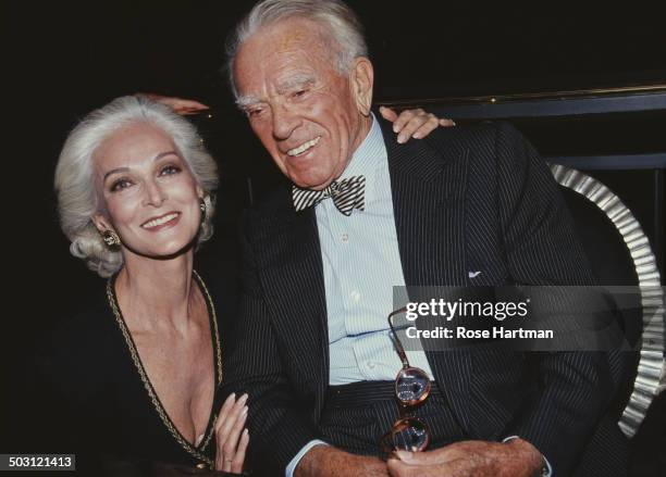 German-American fashion photographer Horst P. Horst and American model and actress Carmen Dell'Orefice attend a launch party for Horst's book at the...