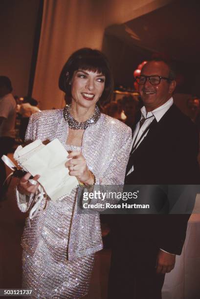 English editor-in-chief of American Vogue Anna Wintour and American fashion photographer Arthur Elgort attend an event at the Bergdorf Goodman store,...