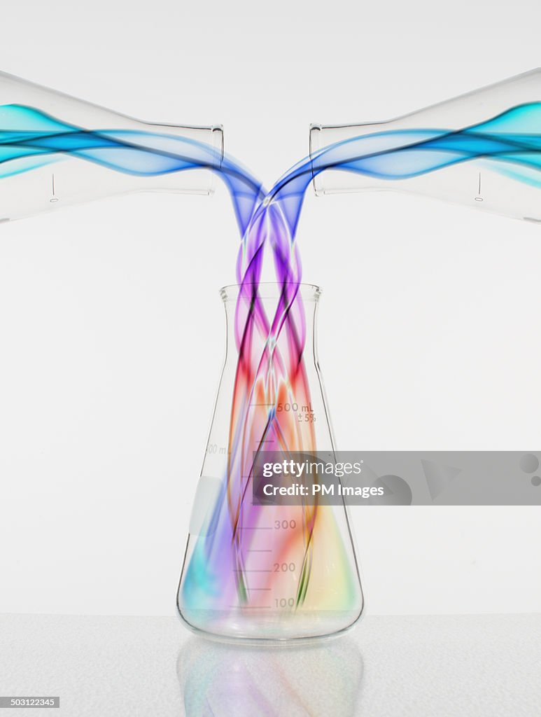 Colors Pouring Into Beaker