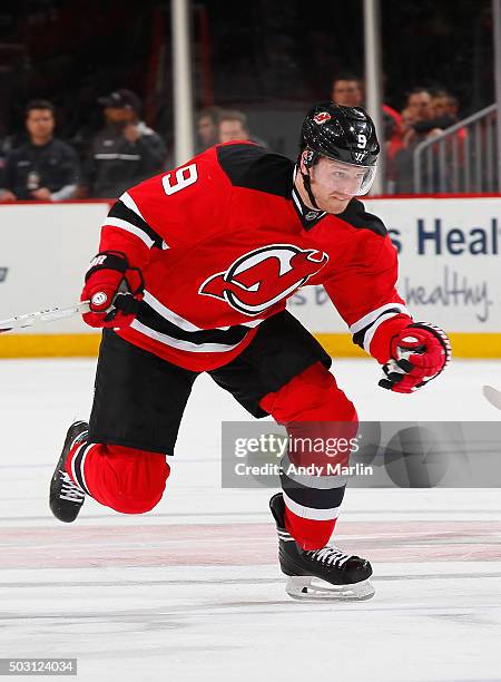 Jiri Tlusty of the New Jersey Devils skates during the game against the Carolina Hurricanes during the game at the Prudential Center on December 29,...