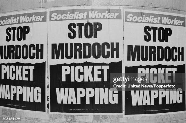 View of bill posters on a wall proclaiming 'Stop Murdoch - Picket Wapping' during the Industrial dispute between the media company News International...