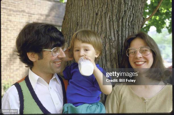 Poet/60s Activist David Shapiro with his wife Lindsay Stamm and his 16-month-old son Daniel at home.