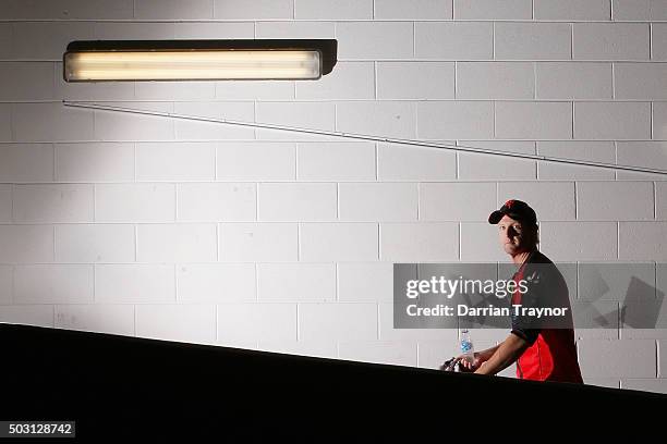 Cameron White of the Melbourne Renegades walks up the players race to warm up before the Big Bash League match between the Melbourne Stars and the...