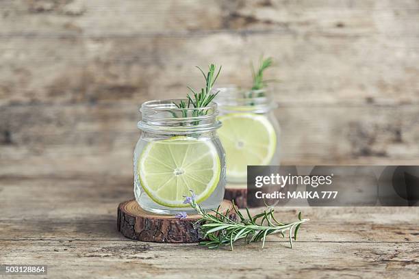 meyer lemonade with rosemary - mason jar stock pictures, royalty-free photos & images