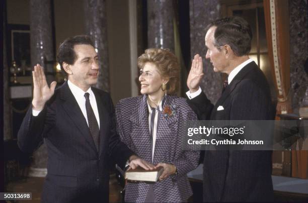 Vice President George H.W. Bush , re-enacting Senate Swear- In Sen. Arlen Specter and his wife.