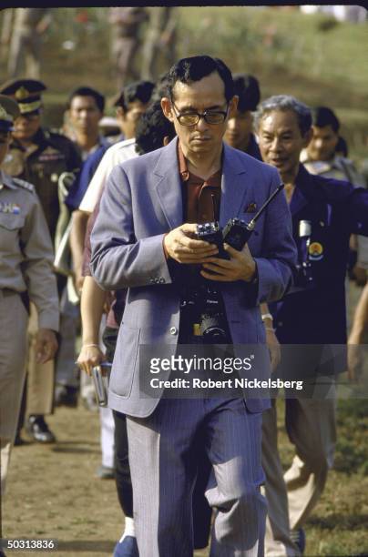 King Bhumibol Adulyadej, aka King Rama, visiting royal sponsored agricultural experiment station at Doi Inthanon Natl. Park.