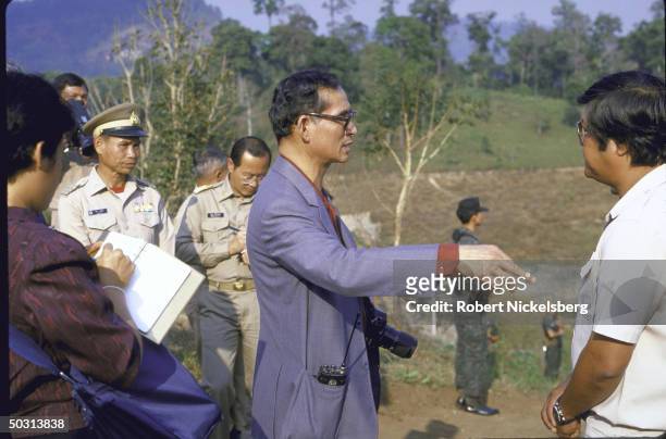 King Bhumibol Adulyadej, aka King Rama, visiting royal sponsored agricultural experiment station at Doi Inthanon Natl. Park.