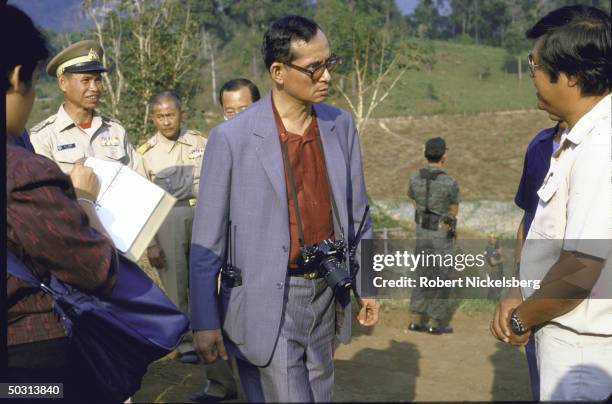 King Bhumibol Adulyadej, aka King Rama, visiting royal sponsored agricultural experiment station at Doi Inthanon Natl. Park.