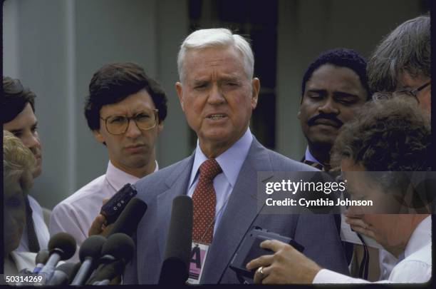 Senator Ernest F. Hollings speaking with reporters after a White House meeting.
